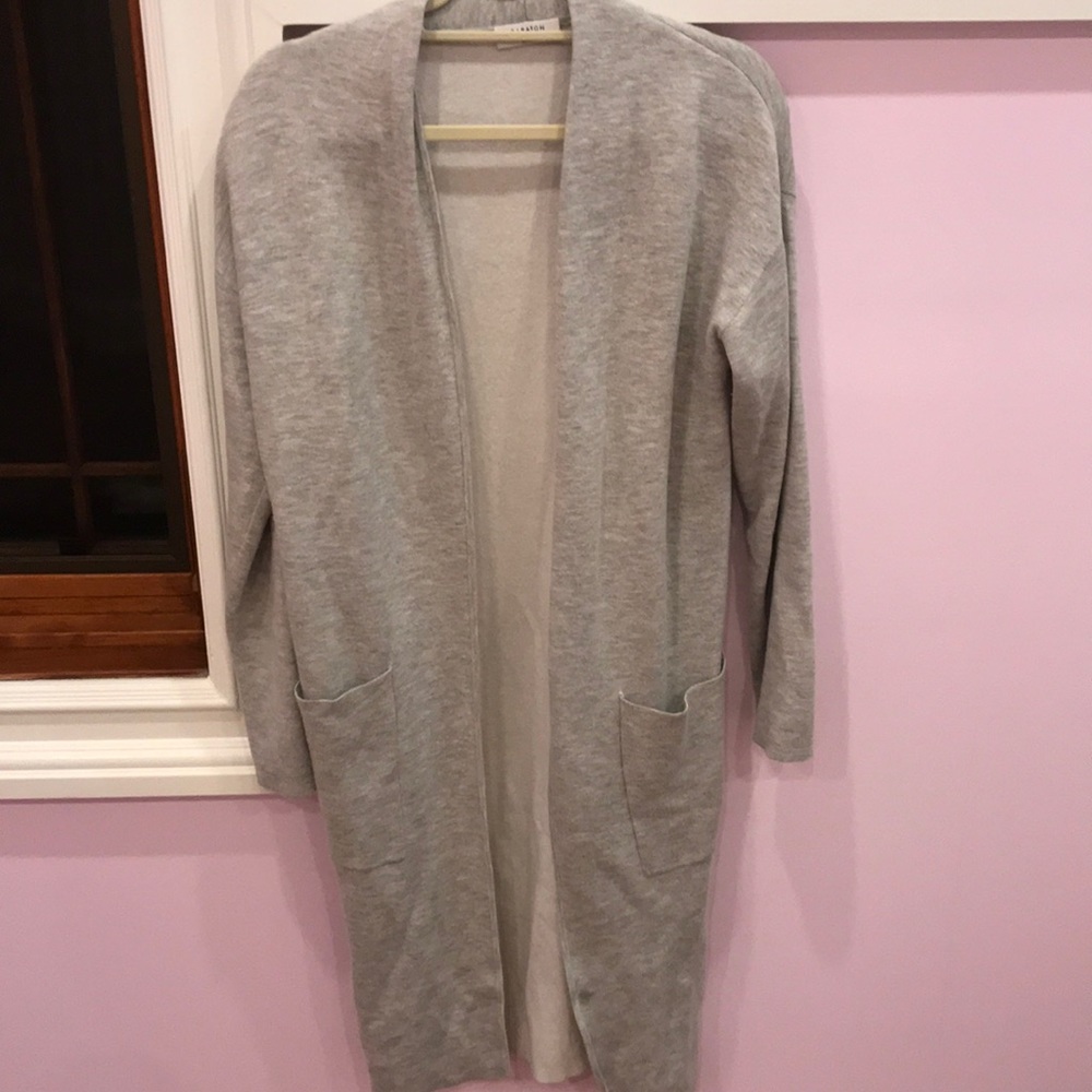 Knee length sweater